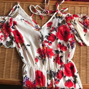 Floral mini romper with open back with strings